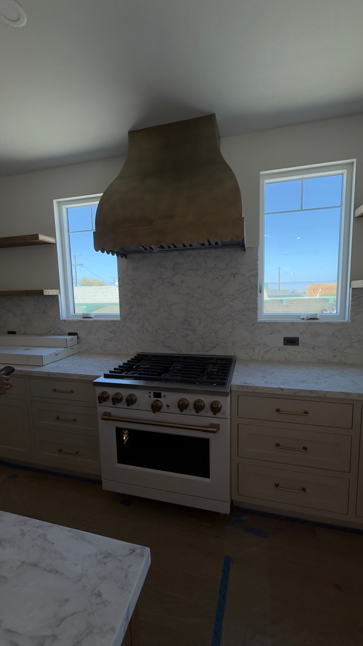 Custom range hood and professional range installation