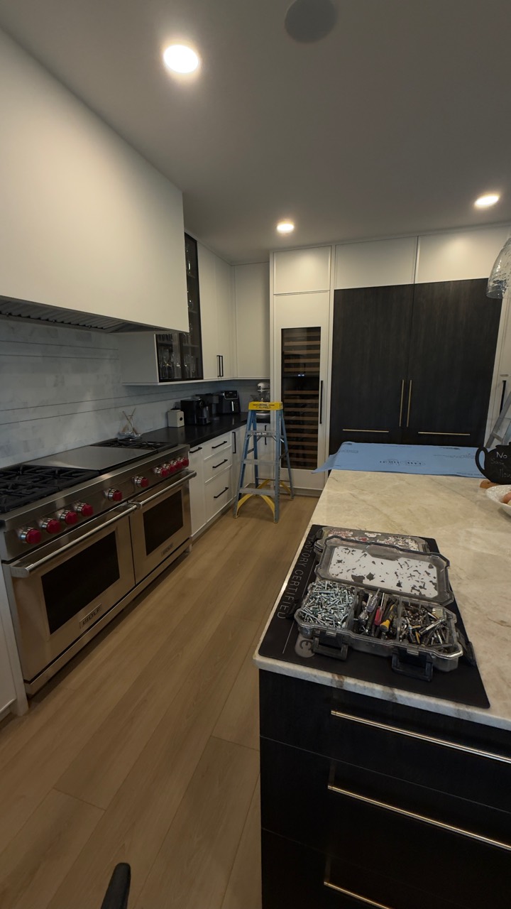 Luxury kitchen appliance installation in progress