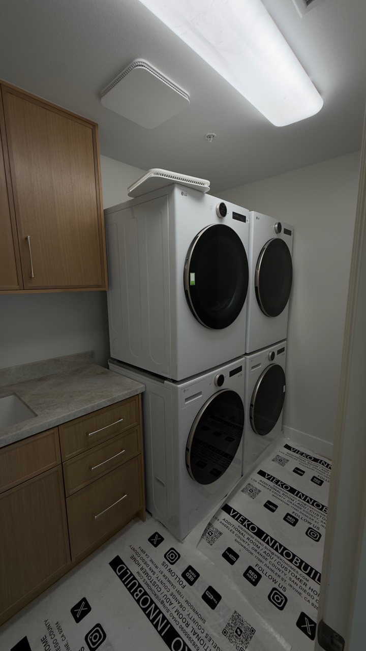 Four-unit washer and dryer installation