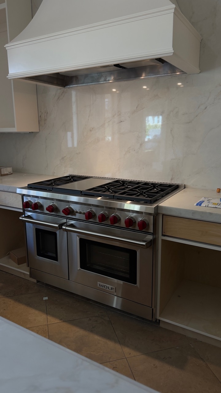 Wolf range and custom hood installation